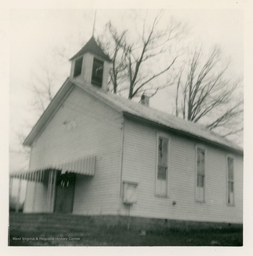 The church in Upper Glade, W. Va. was organized in 1855.  The church was first housed in a log cabin, and several years later a wooden building was built.