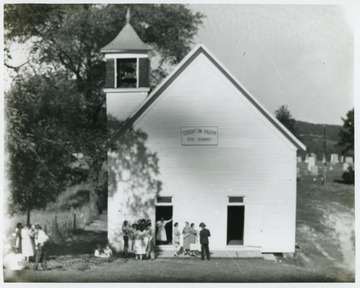 The negative has been reversed on this image.  The Bell Tower should be on the other side of the building.The Pisgah Methodist Church was organized in 1818. The present church is a remodeled version of the church built in 1869. In 1921 it was rebuilt.