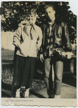 DeWitt, left, and Cooper, right, pose outside of Terra Alta High School during their senior year. 