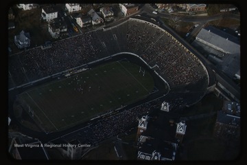 Aerial photograph of a West Virginia University football game against the Virginia Tech football team. The Mountaineers won this game 27-7.