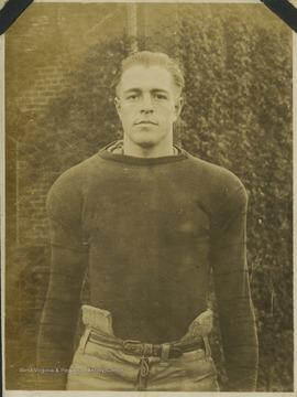A West Virginia University football player identified as "Brooks" is pictured in his practice gear. 