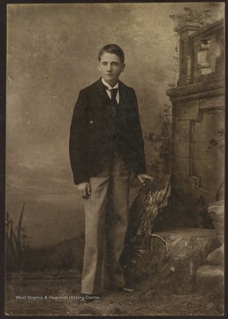 Portrait of Morton in A. M. Slusher's photo studio. 