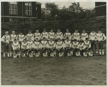A group of young boys gather for a team photo. One of the boys is a McMillan (McMillen) kid.