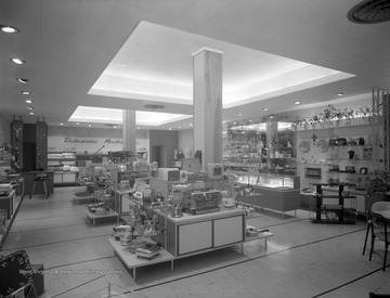 Interior of a store selling home goods such as decorative items, appliances, and tools. 