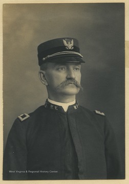 Colonel C. L. Smith, later Brigadier General, graduated from West Virginia University.  He practiced law in Fairmont, W. Va., and established the Fairmont Times with O. S. McKinney.  He was a colonel of the First regiment of the National Guard.