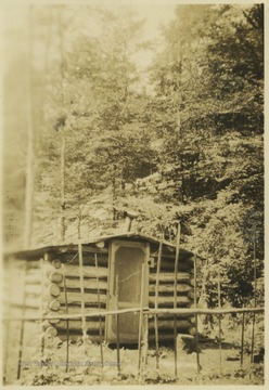 A small log cabin is pictured. 