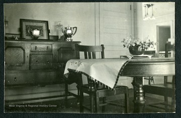 Inside Nitro house No. 29, Nitro, W. Va. Room featured in picture is the dining roomThis was one of the 1,724 "pre-cut" houses Minter Homes Corporation built in Nitro.The design of the layout was named the "Five-Room Executives Residence"