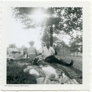Members of the community gather for a picnic in Clarksburg, W. Va.