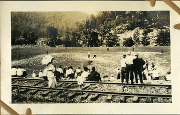 Baseball game beside railroad tracks in Mullens, W. Va.