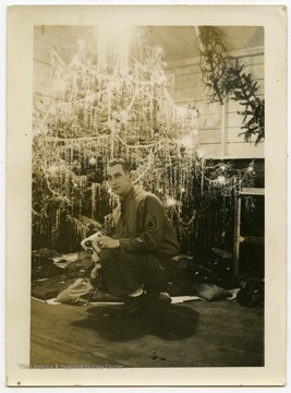 Melvin H. Kimble celebrating Christmas in Germany.Kimble was a native of Moundsville, W. Va.  He was a marksman and member of the 5th Ranger Infantry Battalion during World World II.