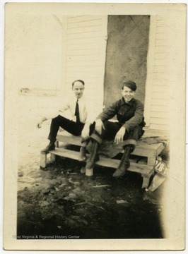 Snapshot of Clark and Frank, members of the Nuzum or Satterfield family.