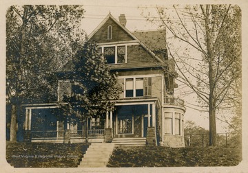 Photo postcard of the Delta Tau Delta fraternity house on North High Street in Morgantown, W. Va.