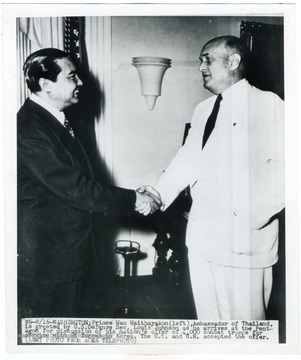 Secretary of Defense Louis Johnson greets Prince Wan Waithayakon of Thailand at the Pentagon during discussion of Thailand's offer of 4,000 combat troops for the war in Korea. 