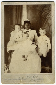 Text on the back reads, "Ruth, Frank, and Bill Maxwell with Ella Jackson, their nurse for many years."