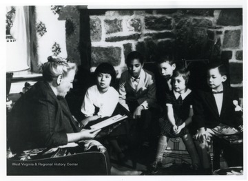Pearl Buck is reads to children at Welcome House, the adoption agency for Asian-American children she founded in 1949.