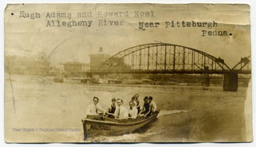 The young men in the boat are members of the U. S. Army Corps of Engineers. Two of the men are identified as Hugh Adams and Howard Noel. They are boating on the Allegheny River near Pittsburgh Penna.