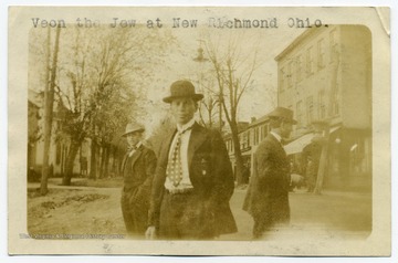 The three men from left to right are identified as Slatan, Veon (identified as Jewish), and Watt.