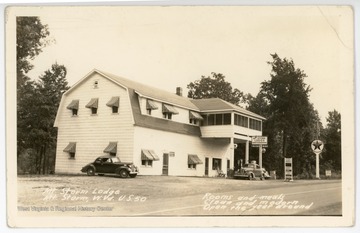 Rest of text reads: "U.S. Route 50. Rooms and meals, clean and modern, open the year round."