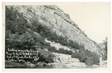 Text reads, "Looking across the Potomac River to Routes 4 and 28 at the foot of Hyres Rocks, Cabins, W. Va."