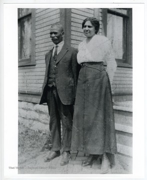 Caption reads: "Mr. Barnett was one of the earliest black students to graduate from Dennison University in Granville, OH (1892) and was the second principal of Douglass High School (1897–1900). Mrs. Barnett lived to be 109 and moved for a while to Columbus, Ohio, to work and send them her two sons to college. She was a major source of history in the Huntington area."Further information on back of photo: "Carter Harrison Barnett (1867–1921) A. B. Dennison University, Granville OH (1892). Callie Jackson Barnett (1871–1980) Graduate of Granville H. S., Granville, OH (1893). Retired attendance officer, Cabell County, WV (1941)."