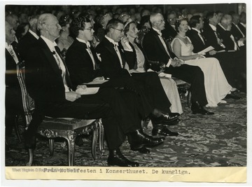Pictured are members of the Swedish royal family, including King Gustav V (fifth from left) and then-Crown Prince Gustav, later to become King Gustav VI Adolf (third from left). At this ceremony, Pearl Buck was present to receive the Nobel Prize in Literature.