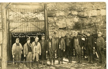 A postcard showing mine inspectors at Mine No.8 at Monongah.