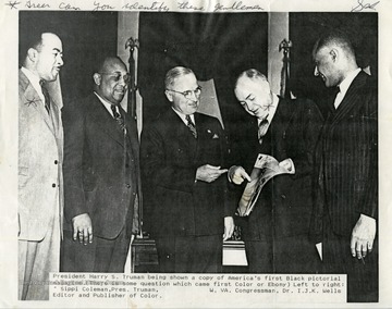 Sippi Coleman, Editor and Publisher of Color and WV Congressman I.J.K. Wells presenting America's first black pictorial magazine to President Harry Truman.