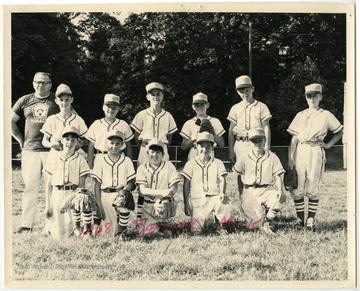 The members of the 1968 "Sanitary Milk" Little League baseball team.