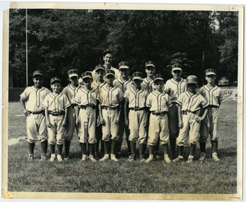 The members of the 'SF" Little League baseball team.