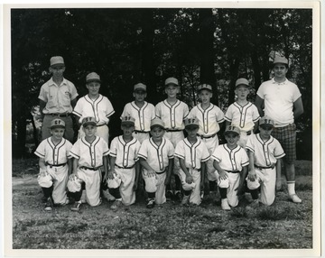 The members of the 1965 "SF" Little League baseball team.