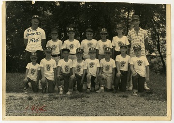 A photo of the 1964 "Knights of Columbus" Little League baseball team with their coach Bill Augers.