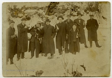 A group of men containing J.R. Caldwell, Bob Hunter,  Johnson ("Johnse") & Willis Hatfield.