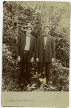 Willis Hatfield and an unidentified individual.