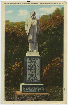 A postcard of the "Devil Anse" Hatfield Monument between Logan and Williamson West Virginia.